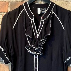 Black Short-Sleeve, Button Women's Blouse with White piping.  Size: Medum